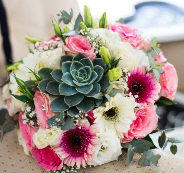 Bridal bouquet combining a green succulent with pink and white flowers